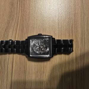 Black Skeleton Dial Watch